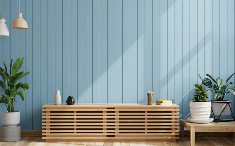 Aparador bajo de lamas de madera en un salón